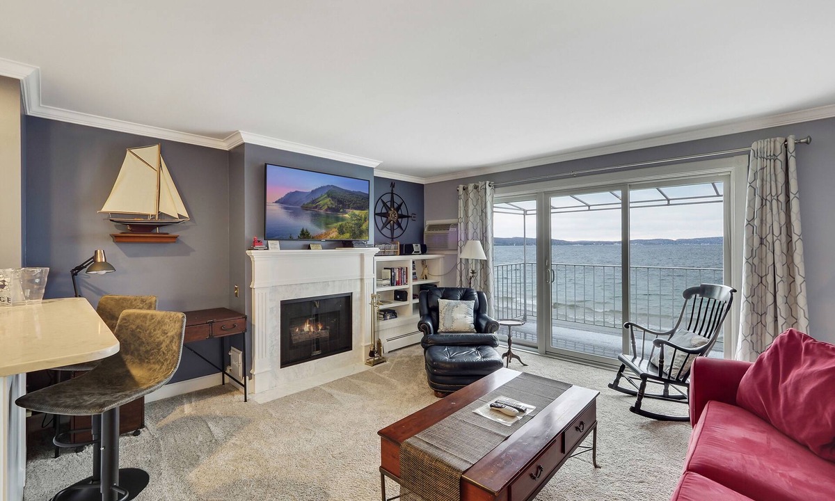 Boyne City Condo | 210 Water Street | Lake Charlevoix Beachfront + Patio | Fireplace