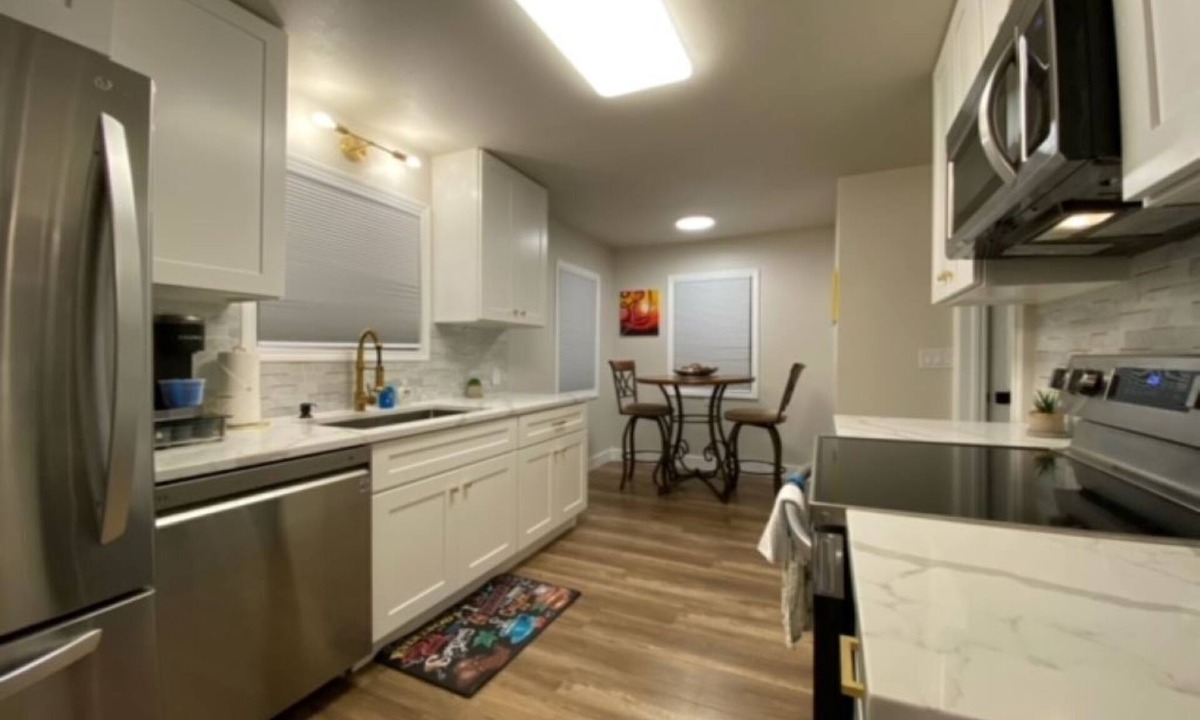 Logan House | Charming Brick Home with bonus space fenced yard