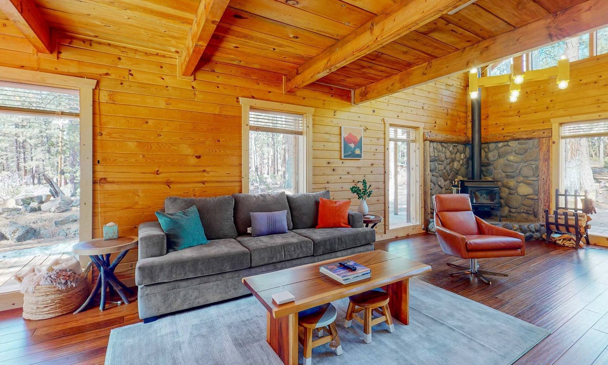 River Forest Acres Cabin | Cozy & colorful retreat with a deck, grill, wood stove, board games, W&D, & AC