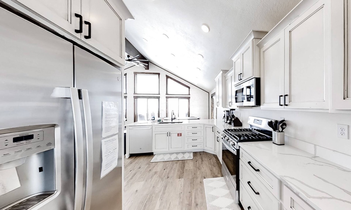Sweetwater House | Dog-friendly house with lake views & gas fireplace - pool & hot tub access