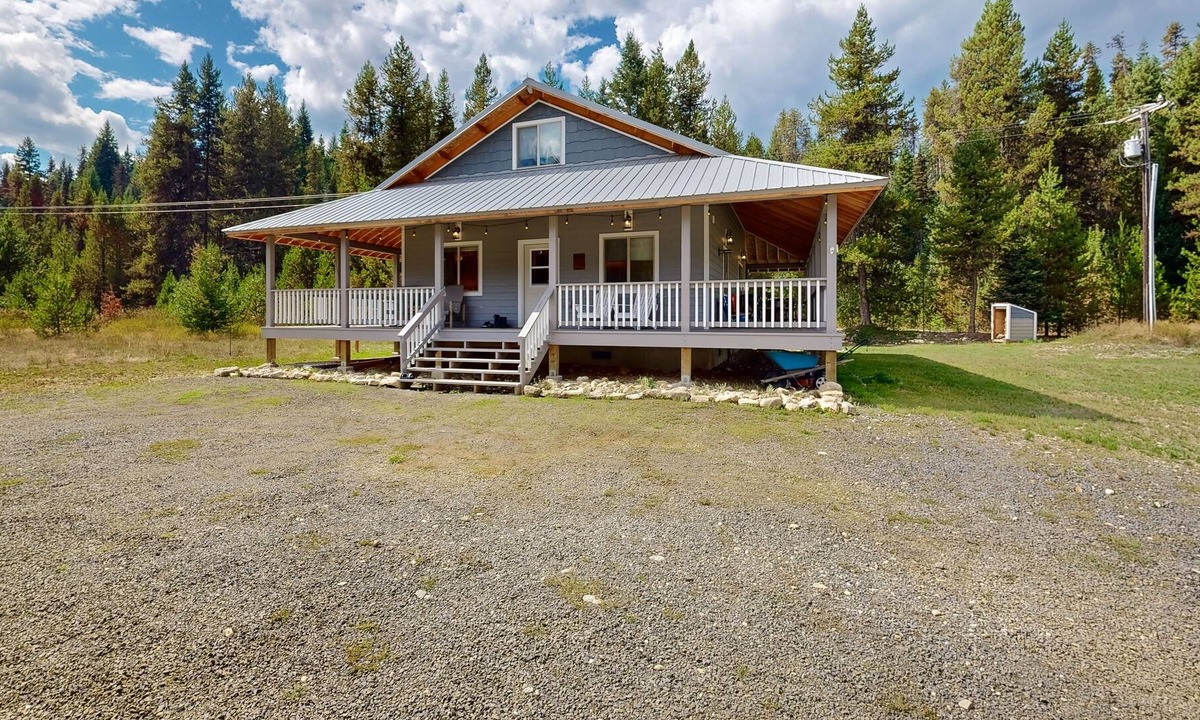 Dixie House | Dog-friendly riverfront home near town with deck, water views, & fireplace