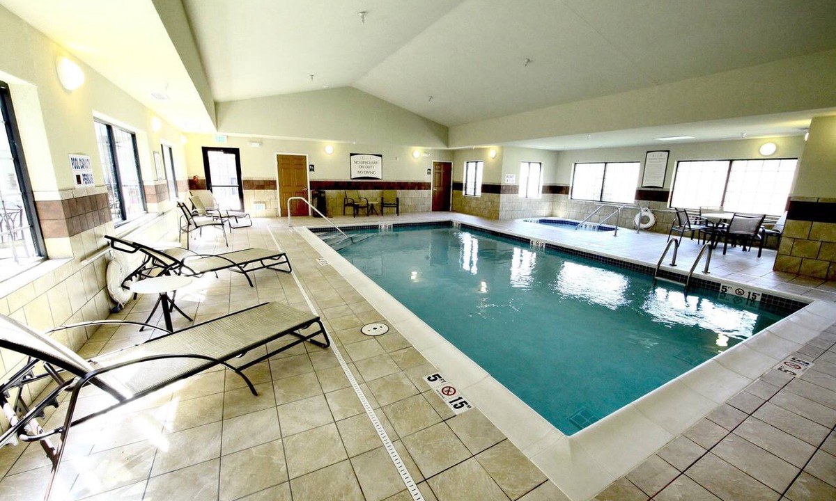 Minot Condo | Free Breakfast. Pool & Hot Tub. Gym. Close to the Minot Air Force Base! Your Next Trip!