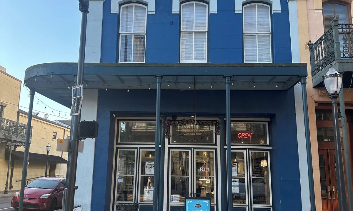 Central Business District Apartment | Historic 1800s Dauphin Street Loft - Above Iconic 109-Year-Old Candy Shop