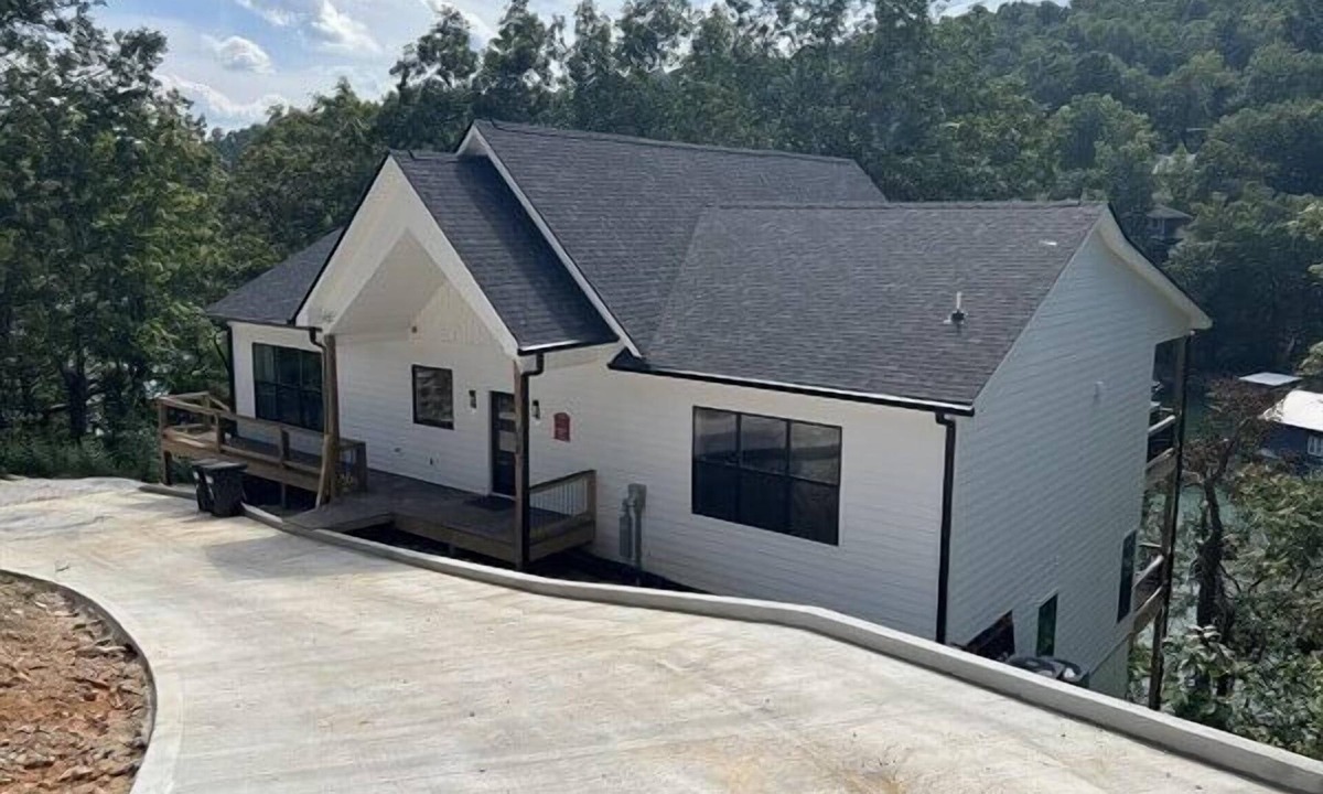 Speedwell House | Lakefront | 2 slip covered dock | Hot tub | Chef's kitchen