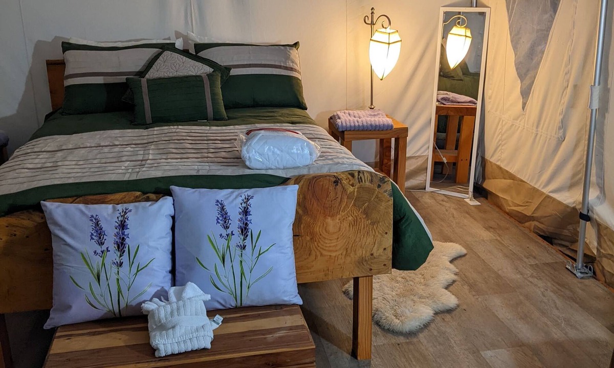 Sequim RV Rental | Lavender Glamping Tent with heater , mini fridge and fire pit.