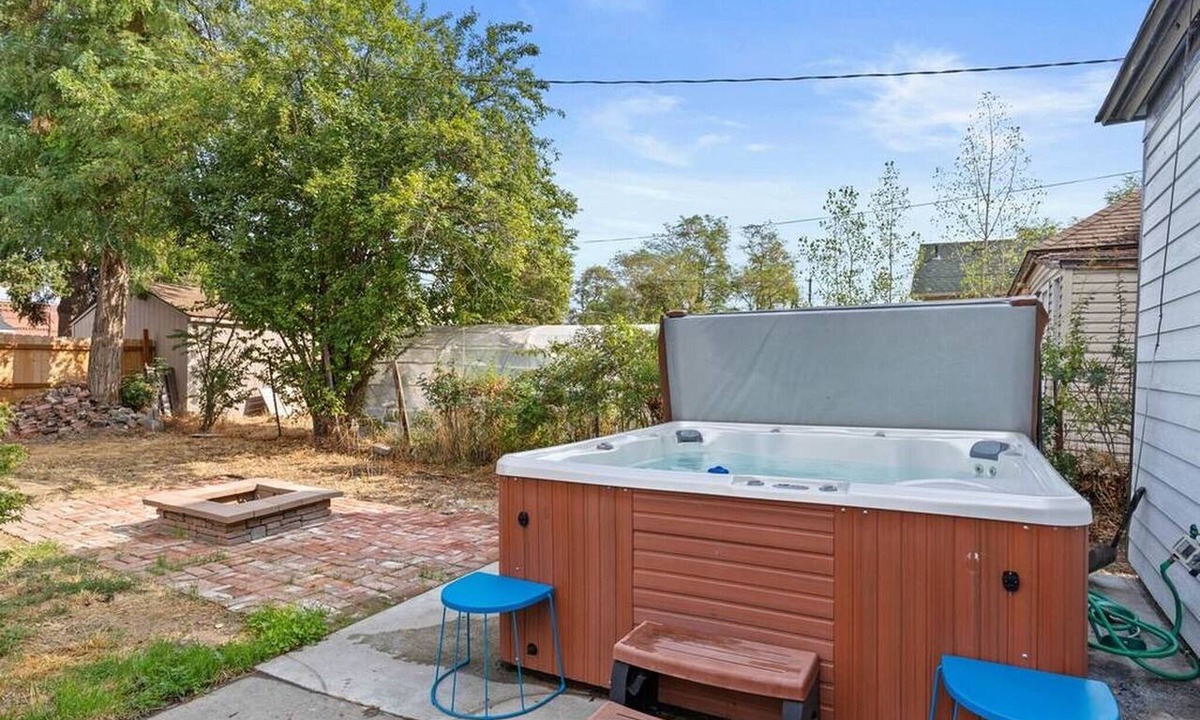 West Central House | Modern 2BR/2BA retreat for 6 with hot tub & stocked kitchen.