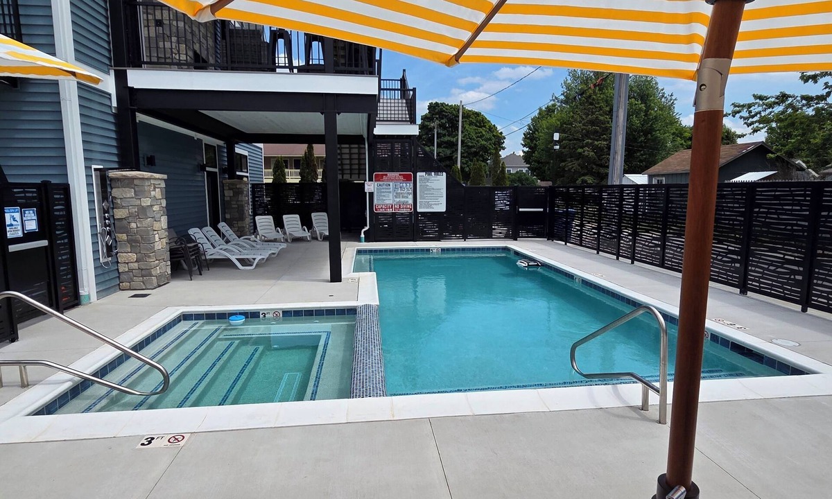 Ludington Condo | New pool! New Building! Swim, Soak & Stay. Sleeps 18!