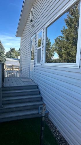 Cascade House | Pet-Friendly Riverfront Getaway with Outdoor Entertaining & Bonus Camper in Cascade, Idaho