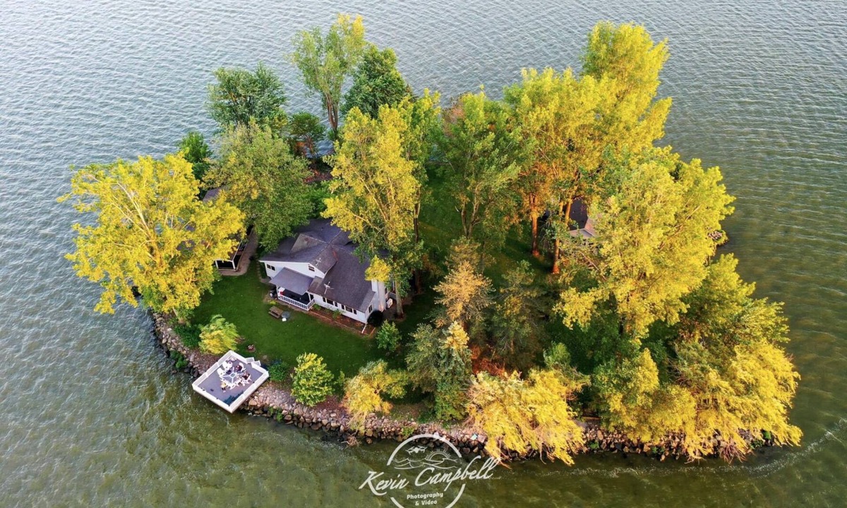 Russells Point House | Private Island! Includes 2 houses, covered boathouse, best sunset on Indian Lake