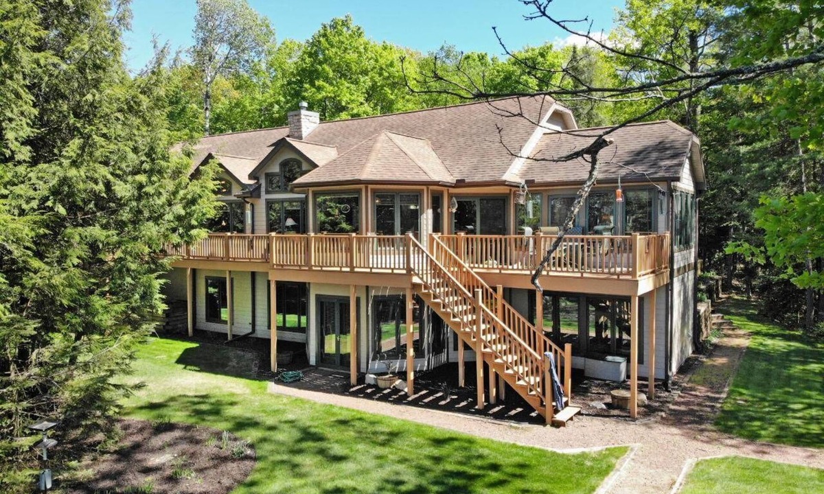 Three Lakes House | Private waterfront lake, sand beach, bar that seats 12, game room,