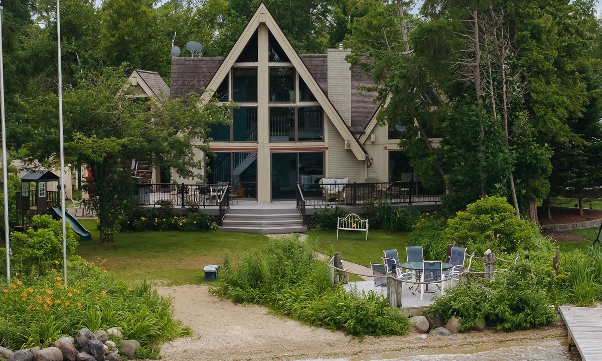 Williamsburg Ski Chalet | Serenity Shores on Lake Skegemog~ Boat, Ski & Sip!