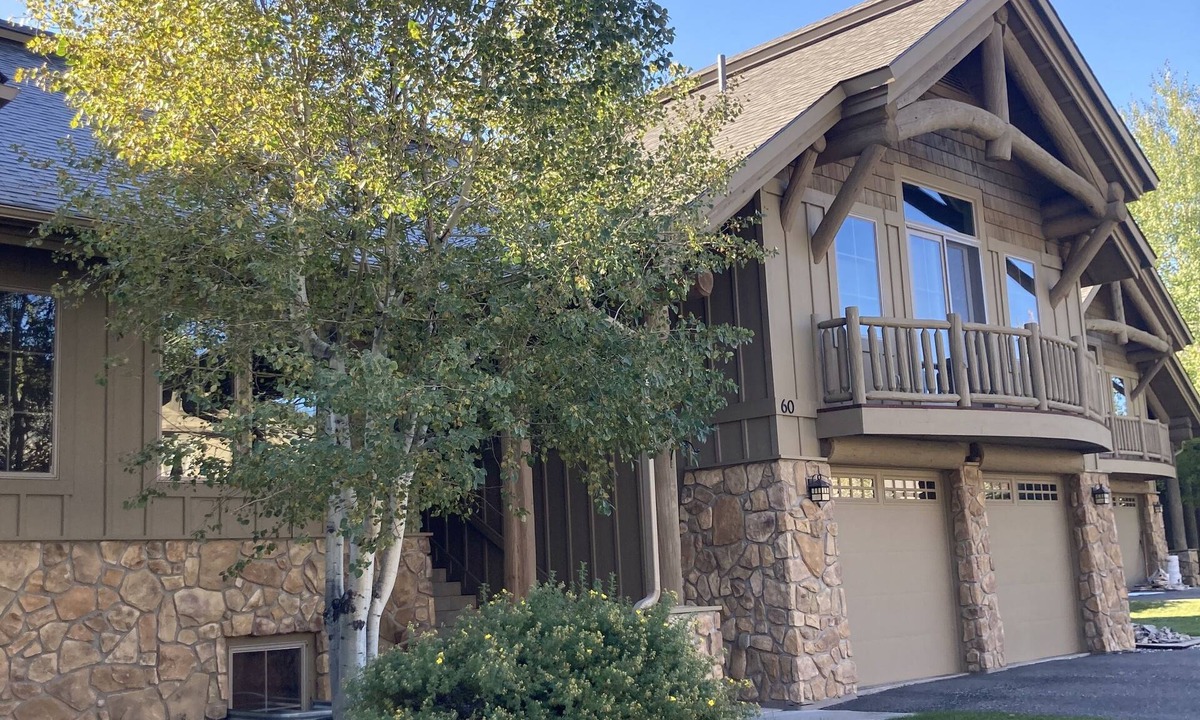Big Sky Meadow Village Condo | Spacious Condo on Golf Course & Creek w/hot tub