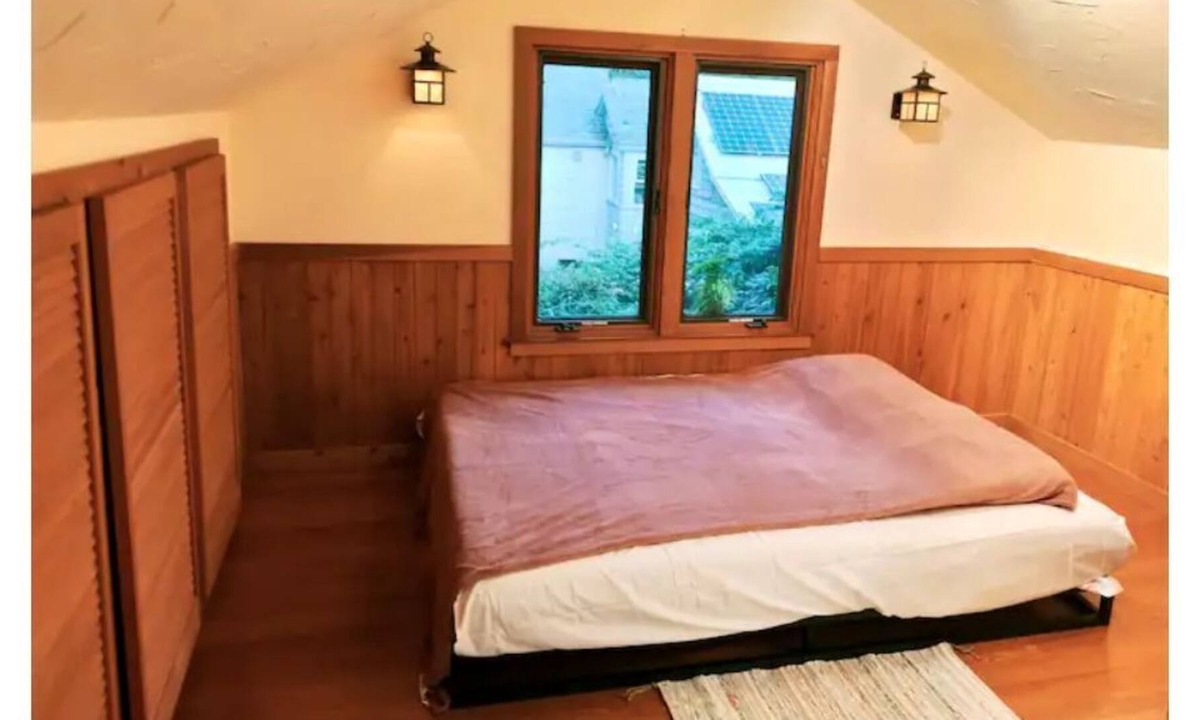 Medford Apartment | The Rose master bedroom at the Wisteria Cottage