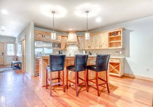 Luxury mountain condo w/shared pool & hot tub, patio, & easy ski access