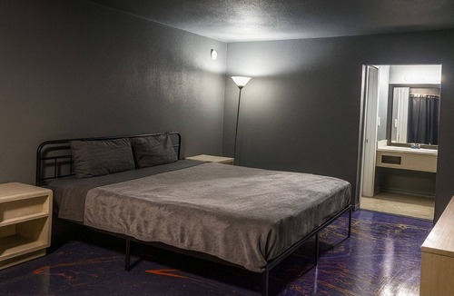 Jackson Apartment | 113 Gated King Bed Hotel Room