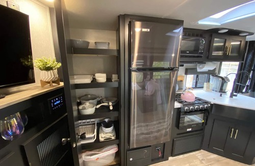 Talent House | 2 separate RV’s with queen-sized beds, dining area, and full kitchen.