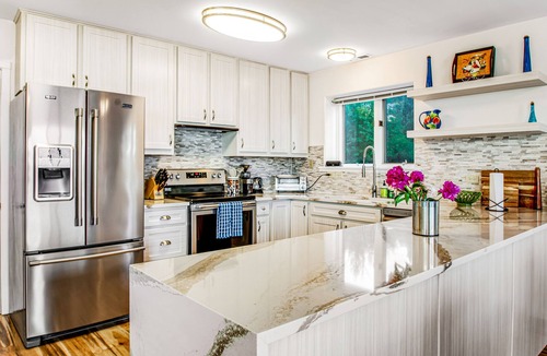 Diamond Point House | 2-story home with water views, 2 decks, hot tub, 2 kitchens - near beach