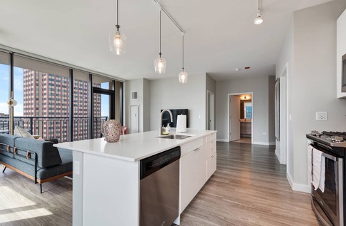 Near North Side Apartment | 2BR Retreat in Downtown + City Skyline Views