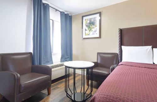 San Augustine Hotel | 3 Best Deal Rooms: 2 Full Beds Non-Smoking Room off Freeway.