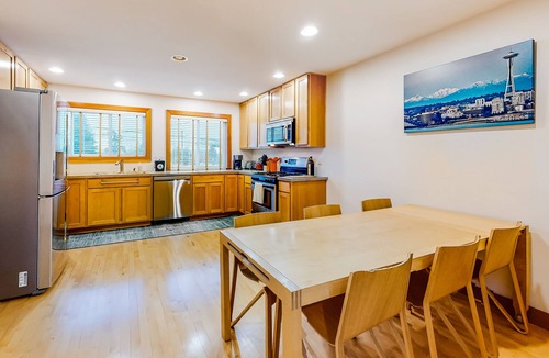 Genesee House | 3-story townhome with fireplace, private balcony, & washer/dryer