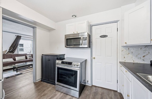 Dearborn Heights House | A charming two-bedroom residence featuring AC in the dynamic city of Detroit.