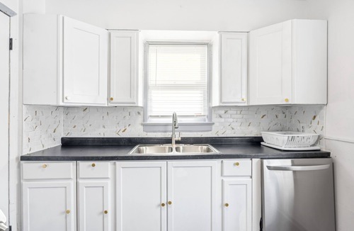 Dearborn Heights House | A charming two-bedroom residence featuring AC in the dynamic city of Detroit.