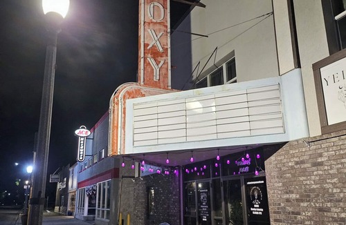 St. Anthony Apartment | A Historic Movie Theater Reborn as an Airbnb, Escape Room, Cafe & Crystal Haven!