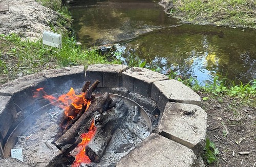 Mio Cabin | A Stream runs through it. Comfy little cabin with a stream by your bedroom.