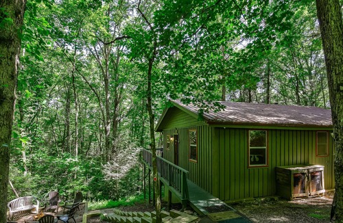 Cashes Valley Cabin | Adorable cabin w/ a private hot tub, screened porch, firepit, & forest views