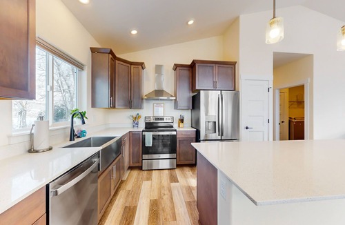 Manson House | Adventure pad with water views, deck, open layout, games, W/D, & central AC