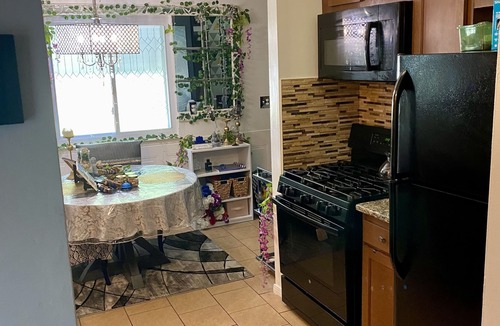 Taylor House | Agape Abode is a unique 420 friendly "hippie playhouse" with a style all its own