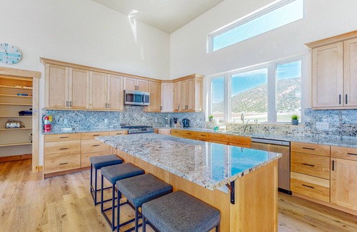 Laketown House | Amazing lakefront home with private beach, boat ramp, courts & fireplace