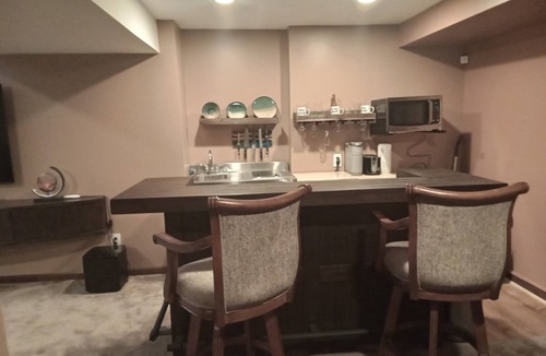 Lansing Apartment | Basement Apartment, Outdoor Hot Tub add on, infrared Sauna, Pool Table and more
