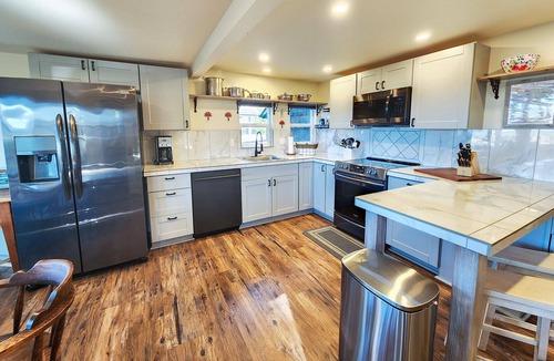 Waldport House | Bayfront Home! Walk to Everything! Hot Tub! Dog Friendly!