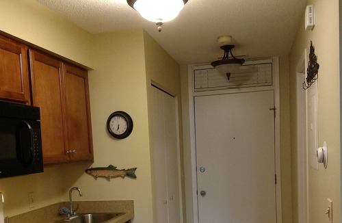 Acme Condo | Beachfront Condo has jacuzzi, 2 bathrms, kitchen, living room, bedroom & patio.