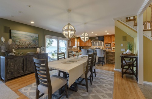 Suttons Bay House | Beautiful Beach Front Home on Suttons Bay w/Sunset Views. Sleeps 10.