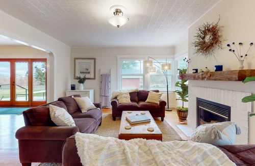 Clinton House | Beautiful farmhouse with private hot tub, pastoral views, gas fireplace, & porch