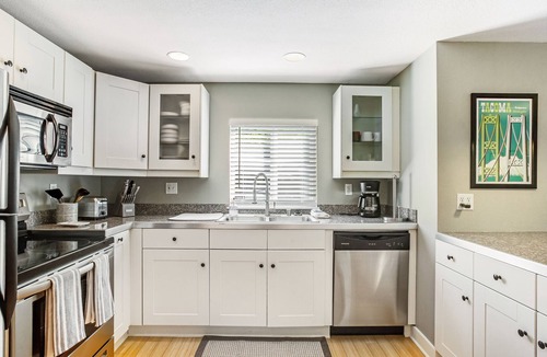 University Place House | Beautifully updated home with enclosed yard, deck, WiFi, & W/D - near everything