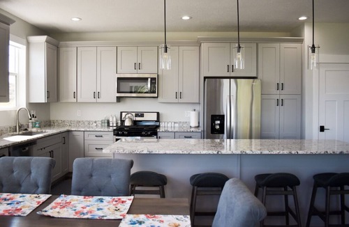 Sweetwater House | Blue Lake Retreat - fully-landscaped home sits on 2nd tee of Bear Lake G.C.