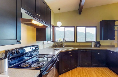 Manson House | Bright Home with Lakeview Wraparound Decks, Seasonal Pool and Game Room