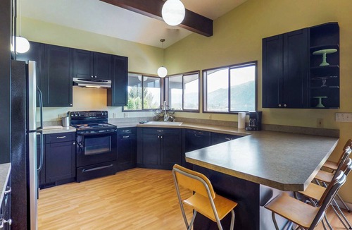 Manson House | Bright Home with Lakeview Wraparound Decks, Seasonal Pool and Game Room