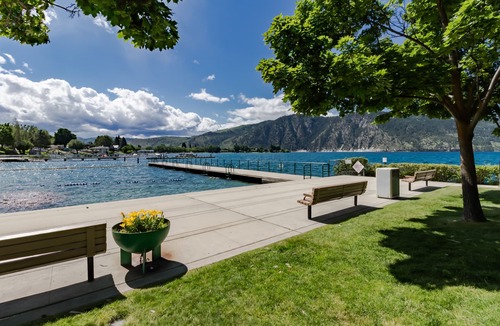Manson House | Bright Home with Lakeview Wraparound Decks, Seasonal Pool and Game Room