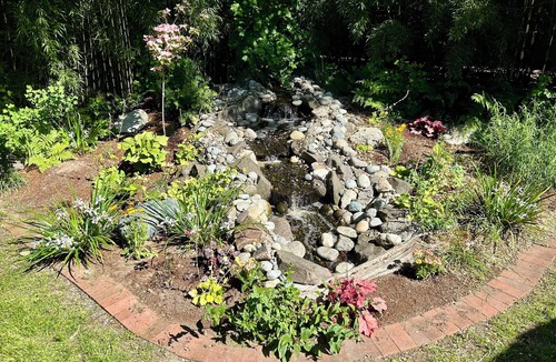 SeaTac House | Cascading Stream Oasis: 4BR Near SeaTac Airport with Air Conditioning