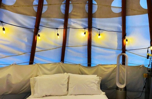 Cave Junction Apartment | Ceremonial Tipi - 20' - Sleeps up to 6 provided padded cots - bring your own sleeping bags
