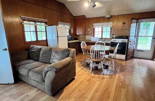 Herron Cabin | Charming 2-bedroom cabin sits on 2.5 acres on Hubbard Lake.