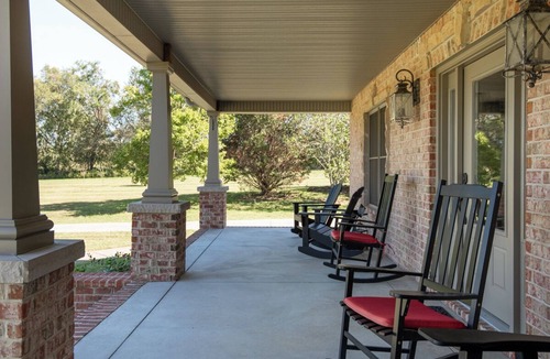 Bethpage House | Charming 3 bed, 2.5 bath farmhouse with hot tub, firepit, and seasonal pool!