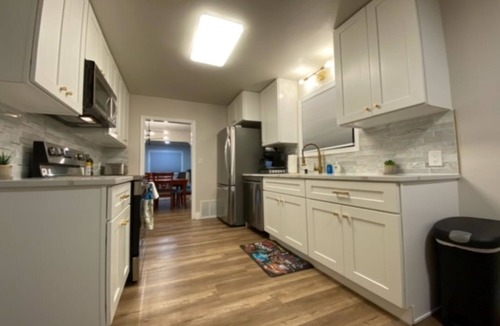 Logan House | Charming Brick Home with bonus space fenced yard
