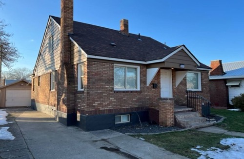 Logan House | Charming Brick Home with bonus space fenced yard