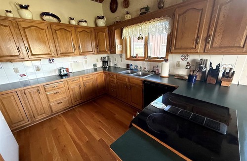 Ennis House | Charming Riverfront Guest House with Deck Overlooking Madison River, Near Ennis, Montana