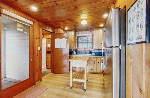 Freeland House | Charming waterfront home with fire pit and access to private beach